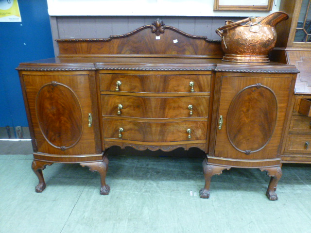 A reproduction walnut sideboard, the top