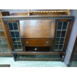 An early 20th century oak bookcase, the