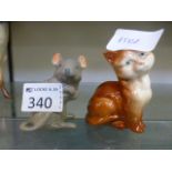 A Beswick figure of a cat together with