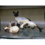 A Beswick figure of a Siamese cat togeth