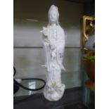 A Blanc De Chine figure of Guanyin