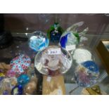 A collection of art glass paperweights