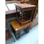 A nest of three oak topped tables along