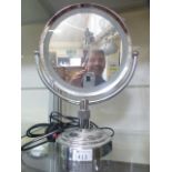 A Revlon light up makeup mirror