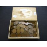 A box of assorted copper coinage