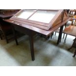 An 18th century oak drop leaf table