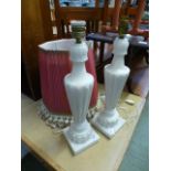 A pair of alabaster columned table lamps