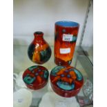 Four items of Poole pottery to include v