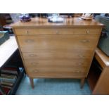 A mid-20th century chest of five long dr