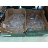 Two trays of assorted glass drinking ves