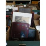 A tray containing photograph albums, cig