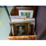 A tray containing a selection of prints,