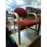 A modern bentwood style chair with red s
