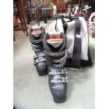 A pair of ladies size 5 ski boots in bag