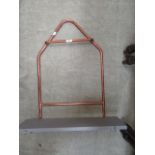 A hand crafted plumbers copper tubing wa