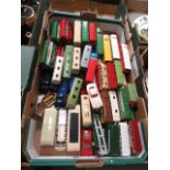 A tray containing die cast buses, cars e