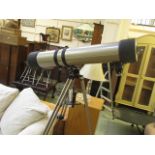 A Tasco telescope with tripod