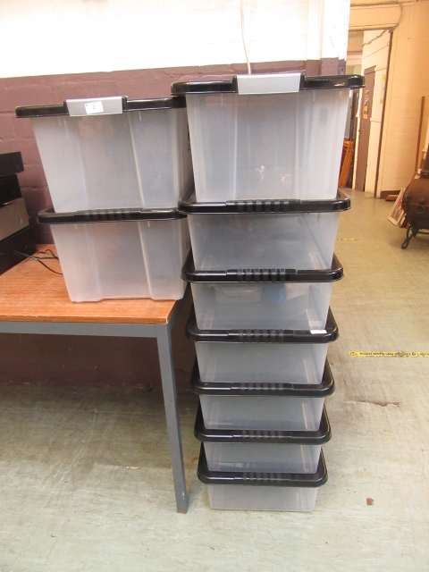 Nine PVC storage boxes with black lids