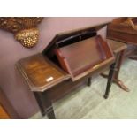 An Edwardian mahogany writing desk with