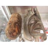 Two African carved wooden masks