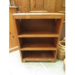 A pine low level bookcase