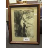 A framed and glazed print of a nude