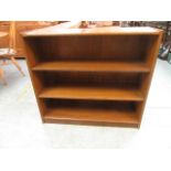 An oak effect low level bookcase