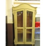 An off-cream painted bevel glazed door F