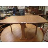 A light Ercol low level drop leaf table