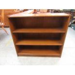 An oak effect low level bookcase