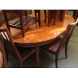 A mid-20th century teak dining table by