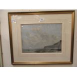 A framed and glazed watercolour of coast