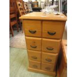 A modern pine four drawer chest