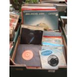 A tray of assorted LPs and 45s by variou
