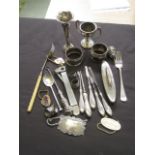 An assortment of silver and white metal