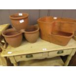 Two clay garden pots
