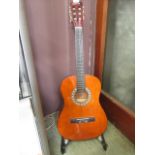 A Evolution W-560/N guitar with stand