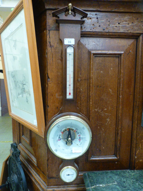 A reproduction mahogany banjo barometer