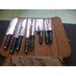 A nine piece knife set in bag