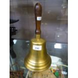 A large brass school bell