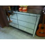 A mirrored chest of six drawers (A/F)