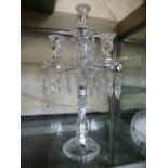 A crystal and white metal candelabra