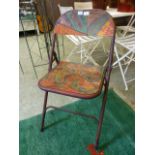 A painted metal folding chair 'World Ama