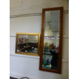 Two modern rectangular wall mirrors