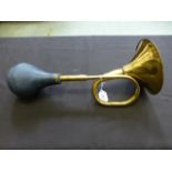 A brass car horn
