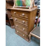 A waxed pine chest of two short over thr