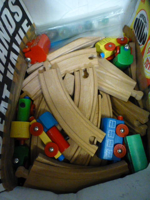 A box containing a wooden child's train