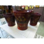 A set of three Coca-Cola buckets