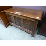 An early 20th century oak blanket box