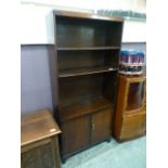 An early 20th century oak bookcase, the